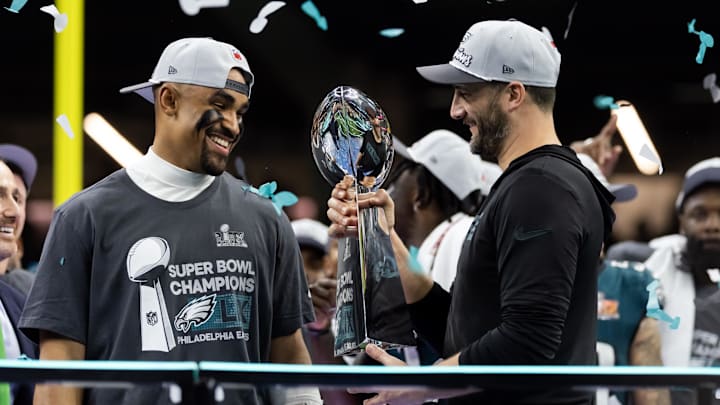 Philadelphia Eagles quarterback Jalen Hurts and head coach Nick Sirianni celebrate with the Vince Lombardi Trophy after defeating the Kansas City Chiefs in Super Bowl LIX Philadelphia Eagles quarterback Jalen Hurts and head coach Nick Sirianni celebrate with the Vince Lombardi Trophy after defeating the Kansas City Chiefs in Super Bowl LIX