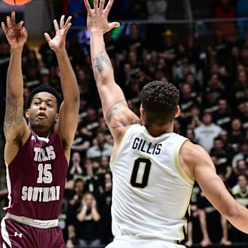 Nov 28, 2023; West Lafayette, Indiana, USA; Texas Southern Tigers guard Zaire Hayes (15) shoots over Purdue Boilermakers forward Mason Gillis (0) during the first half at Mackey Arena. Mandatory Credit: Marc Lebryk-Imagn Images
