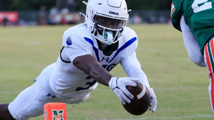 IMG Academy's Eric McFarland (3) looks to help the No. 1 Ascenders ascend to 6-0 on Friday against No. 10 Venice at Powell Davis Stadium.