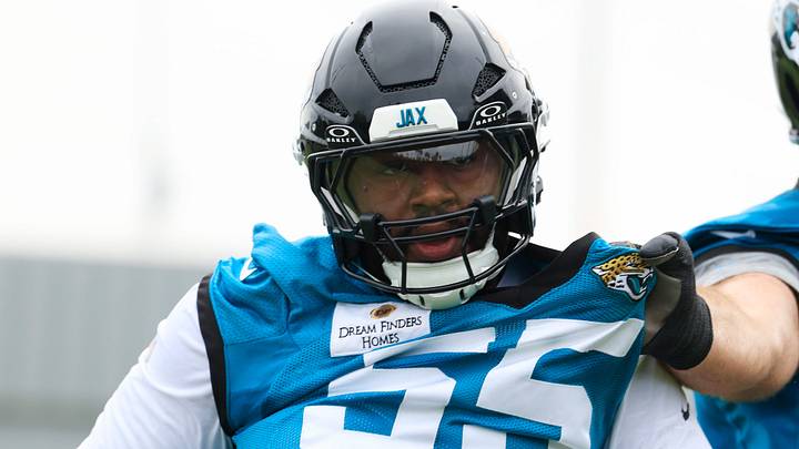 Jacksonville Jaguars offensive tackle Chuma Edoga (55) is fended off by offensive lineman Kilian Zierer (78) during the first day of minicamp at the Miller Electric Center, Tuesday, June 9, 2026, in Jacksonville, Fla.
