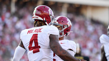 Oct 5, 2024; Nashville, Tennessee, USA;  Alabama Crimson Tide quarterback Jalen Milroe (4) and wide receiver Ryan Williams (2) celebrate the touchdown during the second half at FirstBank Stadium. Mandatory Credit: Steve Roberts-Imagn Images
