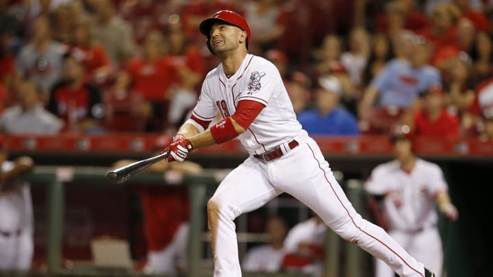 Cincinnati Reds first baseman Joey Votto (19) doubles in the fifth inning, scoring Cincinnati Reds center fielder Billy Hamilton (6) (not pictured) during the MLB game between the Cincinnati Reds and St. Louis Cardinals, Thursday, Sept. 10, 2015, at Great American Ball Park in Cincinnati.