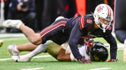 Nov 25, 2023; Salt Lake City, Utah, USA; Colorado Buffaloes running back Dylan Edwards (3) gets tackled by Utah Utes safety Cole Bishop (8) at Rice-Eccles Stadium. Mandatory Credit: Christopher Creveling-USA TODAY Sports