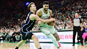 Orlando Magic forward Franz Wagner (22) tries to steal the ball from Boston Celtics forward Jayson Tatum (0) during the second half at TD Garden.
