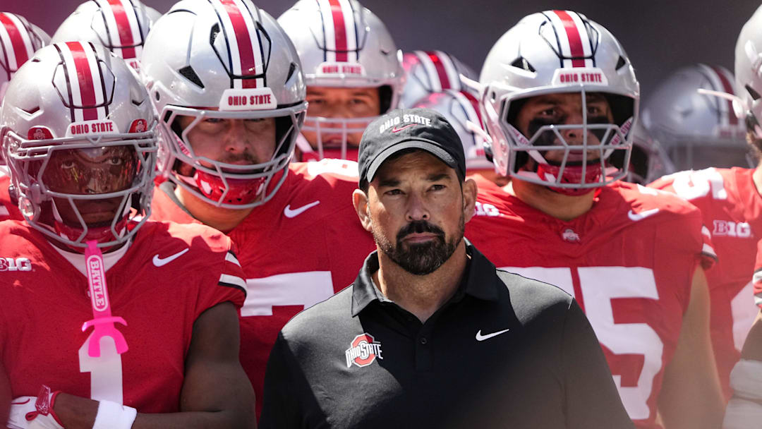 Ohio State Buckeyes head coach Ryan Day leads his team onto the field prior to the NCAA football game against the Texas Longhorns at Ohio Stadium on Aug. 30, 2025.