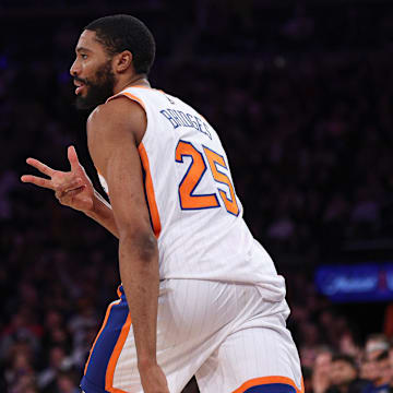 Mar 22, 2025; New York, New York, USA; New York Knicks forward Mikal Bridges (25) reacts after making a three point basket during the first half against the Washington Wizards at Madison Square Garden. Mandatory Credit: Vincent Carchietta-Imagn Images