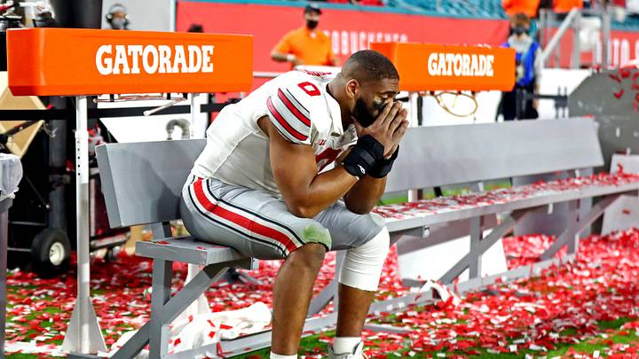 Jan 11, 2021; Miami Gardens, Florida, USA; Ohio State Buckeyes defensive end Jonathon Cooper (0) reacts after being defeated by the Alabama Crimson Tide in the 2021 College Football Playoff National Championship Game. Mandatory Credit: Mark J. Rebilas-Imagn Images