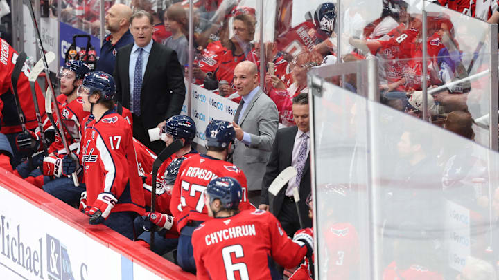 Apr 4, 2025; Washington, District of Columbia, USA; Washington Capitals head coach Spencer Carbery (center) reacts from behind the bench during the first period against the Chicago Blackhawks at Capital One Arena. Mandatory Credit: Amber Searls-Imagn Images