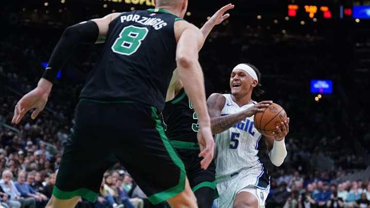 Apr 29, 2025; Boston, Massachusetts, USA; Orlando Magic forward Paolo Banchero (5) drivers the ball against the Boston Celtics in the second quarter during game five of first round for the 2025 NBA Playoffs at TD Garden. Mandatory Credit: David Butler II-Imagn Images Apr 29, 2025; Boston, Massachusetts, USA; Orlando Magic forward Paolo Banchero (5) drivers the ball against the Boston Celtics in the second quarter during game five of first round for the 2025 NBA Playoffs at TD Garden. Mandatory Credit: David Butler II-Imagn Images