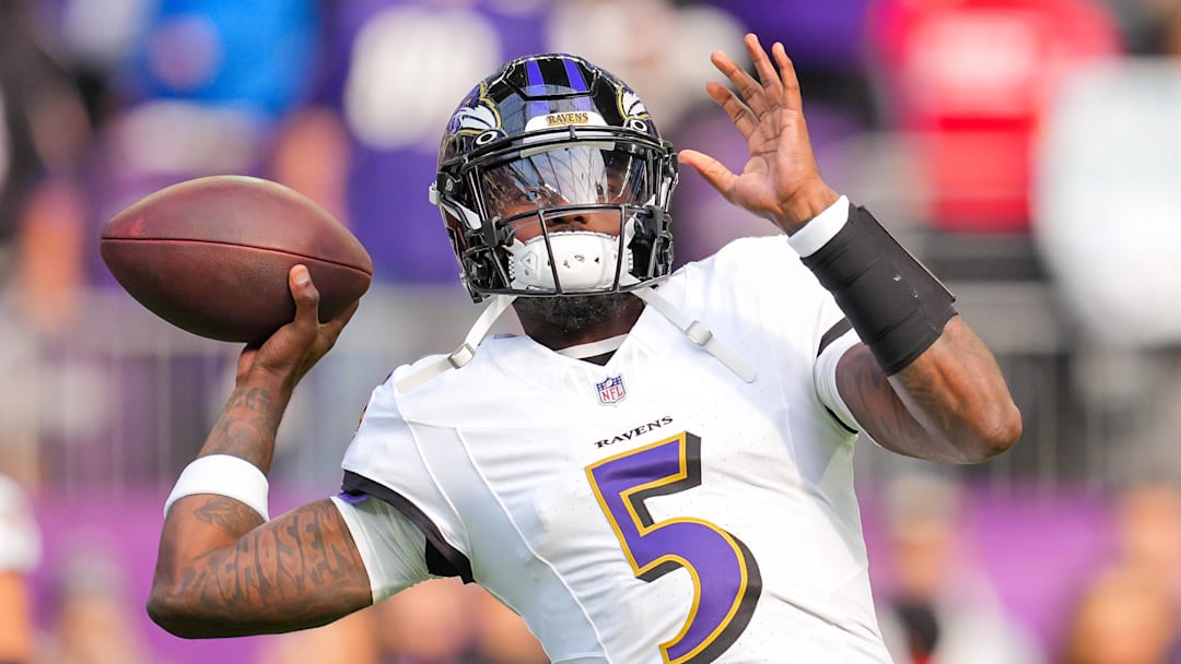 Nov 9, 2025; Minneapolis, Minnesota, USA; Baltimore Ravens quarterback Tyler Huntley (5) warms up before the game against the Minnesota Vikings at U.S. Bank Stadium. Mandatory Credit: Brad Rempel-Imagn Images