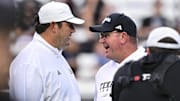 Mississippi State Bulldogs head coach Jeff Lebby greets Texas A&M Aggies head coach Mike Elko prior to the game at Kyle Field.