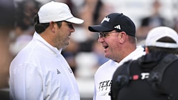Mississippi State Bulldogs head coach Jeff Lebby greets Texas A&M Aggies head coach Mike Elko prior to the game at Kyle Field.