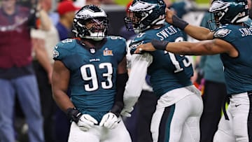 Feb 9, 2025; New Orleans, LA, USA; Philadelphia Eagles defensive tackle Milton Williams (93) celebrates with defensive end Brandon Graham (55) after a play against the Kansas City Chiefs during the first half of Super Bowl LIX at Caesars Superdome. Mandatory Credit: Bill Streicher-Imagn Images