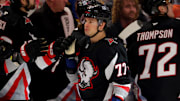 Apr 8, 2025; Buffalo, New York, USA;  Buffalo Sabres right wing JJ Peterka (77) celebrates his goal with teammates during the third period against the Carolina Hurricanes at KeyBank Center. Mandatory Credit: Timothy T. Ludwig-Imagn Images