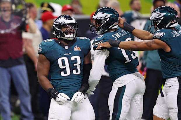  Philadelphia Eagles defensive tackle Milton Williams (93) celebrates with defensive end Brandon Graham