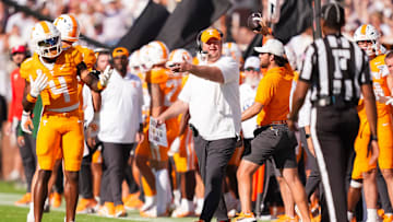 Tennessee coach Josh Heupel and Tennessee wide receiver Mike Matthews (4) want a flag during a college football game between Tennessee and Mississippi State at Davis Wade Stadium in Starkville, Miss., on Sept. 27, 2025.