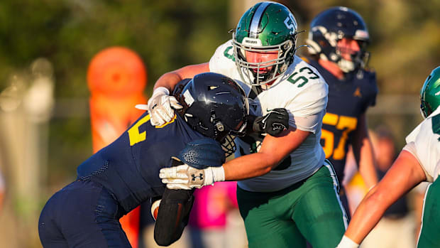 The Naples Golden Eagles compete against the Venice Indians in a spring football game at Staver Field in Naples, Fla., on Tue