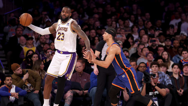 Feb 3, 2024; New York, New York, USA; Los Angeles Lakers forward LeBron James (23) controls the ball against New York Knicks guard Josh Hart (3) during the fourth quarter at Madison Square Garden. Mandatory Credit: Brad Penner-USA TODAY Sports