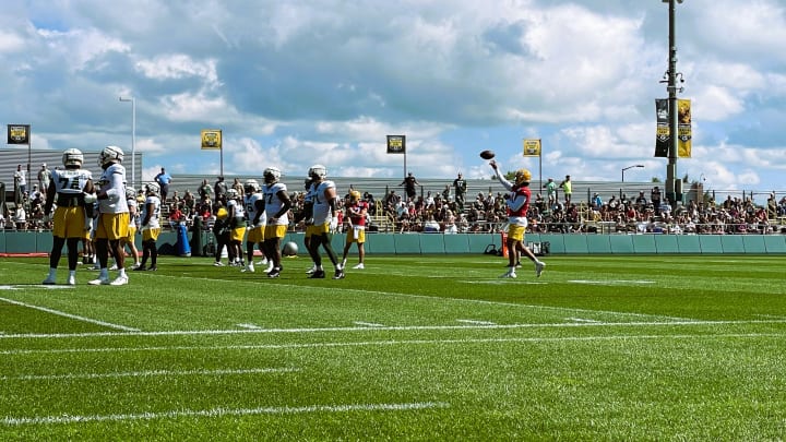 Jordan Love and the Green Bay Packers get ready for the start of practice at training camp on Tuesday, Aug. 20.