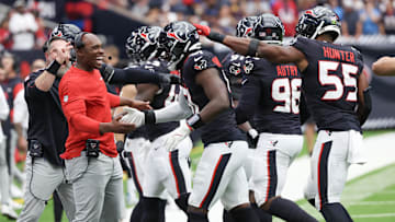Oct 27, 2024; Houston, Texas, USA;  Houston Texans head coach DeMeco Ryans celebrates defensive end Will Anderson Jr. (51) sack against the Indianapolis Colts quarterback Anthony Richardson (5) (not pictured) in the second quarter at NRG Stadium. Mandatory Credit: Thomas Shea-Imagn Images