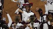 May 8, 2025; Athens, GA, USA; Texas A&M infielder Kennedy Powell (1) reacts to her two-run homer with teammates during a game against South Carolina at Jack Turner Stadium. Mandatory Credit: Mady Mertens-Imagn Images