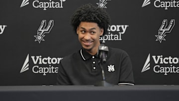San Antonio first-round draft pick Dylan Harper reacts to a question from the media during a press conference.