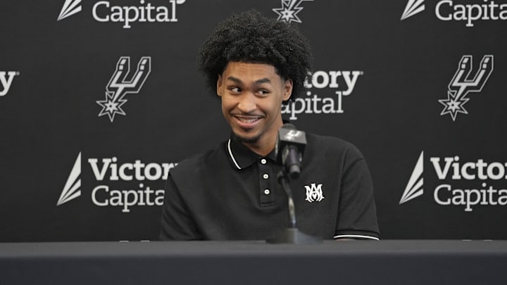 San Antonio first-round draft pick Dylan Harper reacts to a question from the media during a press conference.