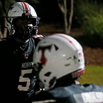 North Oconee's Khamari Brooks (5) celebrate with North Oconee's Braxton Goolsby (4) after scoring a touchdown during a GHSA high school football game against Jefferson in Bogart, Ga., on Friday, Sept. 13, 2024. The undefeated Titans join this week's Top 25 Georgia High School Football Rankings at No. 24.