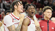 Arkansas Razorbacks forwards Trevon Brazile (4) and Adou Thiero (3) celebrate after the game against the Georgia Bulldogs at Bud Walton Arena. Arkansas won 68-65.