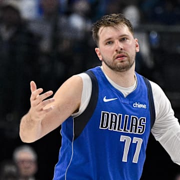 Mar 5, 2024; Dallas, Texas, USA; Dallas Mavericks guard Luka Doncic (77) reacts to a foul call during the second quarter against the Indiana Pacers at the American Airlines Center. Mandatory Credit: Jerome Miron-Imagn Images