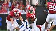 Sep 12, 2025; Bloomington, Indiana, USA; Indiana Hoosiers running back Roman Hemby (1) returns a kickoff during the first half against the Indiana State Sycamores at Memorial Stadium. Mandatory Credit: Robert Goddin-Imagn Images
