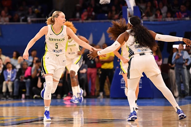 Dallas Wings guards Paige Bueckers, Arike Ogunbowale