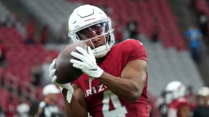 Arizona Cardinals receiver Rondale Moore (4) warms up before their game against the Atlanta Falcons