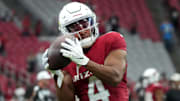 Arizona Cardinals receiver Rondale Moore warms up before their game against the Atlanta Falcons at State Farm Stadium in Glendale, Ariz., on Nov. 12, 2023.