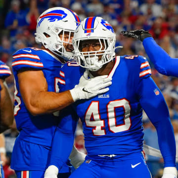 Sep 19, 2022; Orchard Park, New York, USA; Buffalo Bills linebacker Von Miller (40) and Buffalo Bills linebacker Matt Milano (58) react to making a play during the first half against the Tennessee Titans at Highmark Stadium. Mandatory Credit: Gregory Fisher-USA TODAY Sports
