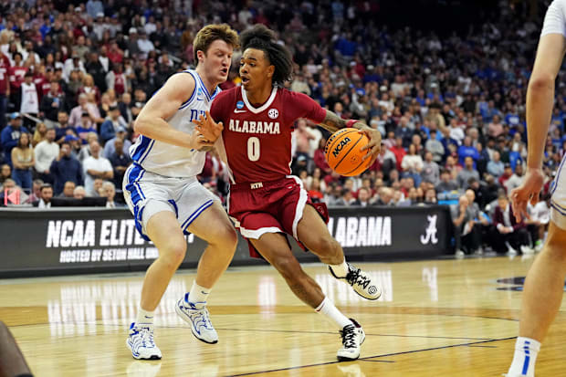 Alabama point guard Labaron Philon drives to the basket against Duke guard Kon Knueppel.