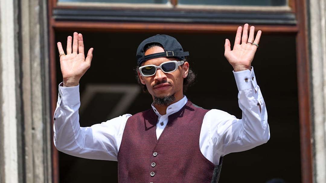 Leroy Sane celebrating Bayern Munich title win in May. 