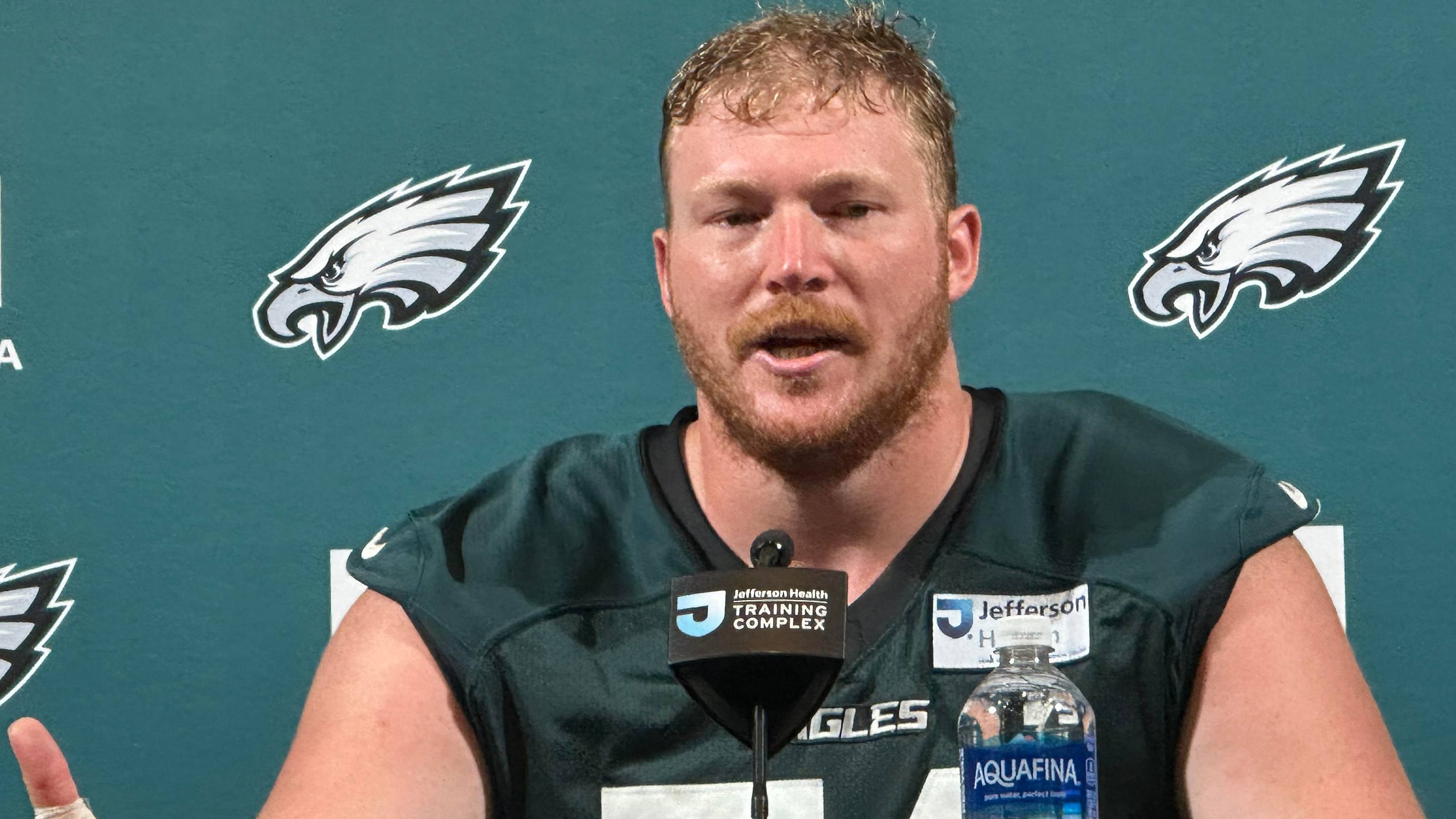 Eagles center Cam Jurgens speaks to reporters on June 10, 2026.