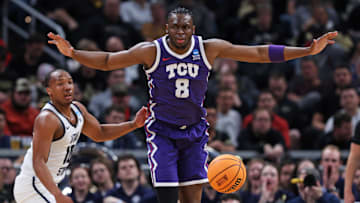 Mar 22, 2024; Indianapolis, IN, USA; TCU Horned Frogs center Ernest Udeh Jr. (8) reacts to a play during the second half against the Utah State Aggies in the first round of the 2024 NCAA Tournament at Gainbridge FieldHouse. Mandatory Credit: Trevor Ruszkowski-Imagn Images