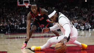 Mar 1, 2024; Chicago, Illinois, USA; Milwaukee Bucks forward Jae Crowder (99) and Chicago Bulls guard Ayo Dosunmu (12): David Banks-USA TODAY Sports