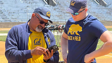 Mo Saatara with Cal discus star Mykolas Alekna
