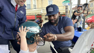Fletcher Cox made his first public appearance after retiring on April 9 following  12 years with the Philadelphia Eagles by judging an Italian Hoagie contest at the Italian Market in Philadelphia and signing autographs on helmets and jerseys on Sunday, May 19, 2024 