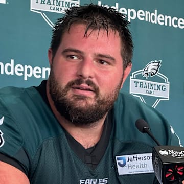 Pro Bowl LG Landon Dickerson talks to reporters after practice on July 25, 2025.