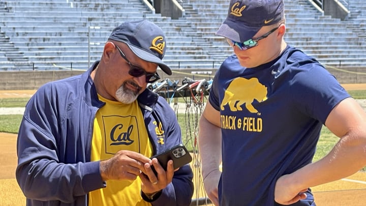 Cal throws coach Mo Saatara and Mykolas Alekna