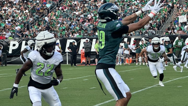 Eagles receiver Johnny Wilson makes a catch in front of Kelee Ringo during the Eagles open practice on Aug. 1, 2024.