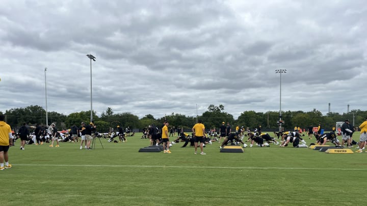 Players warmup ahead of the Missouri Tigerspractice Wednesday afternoon.