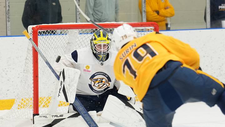 Egor Surin shoots at goalie Jack Ivankovic at Nashville Predators development camp.