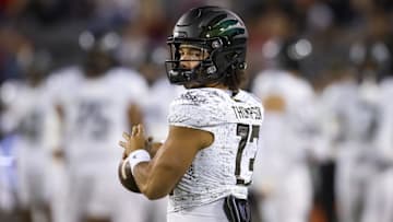 Oct 8, 2022; Tucson, Arizona, USA; Oregon Ducks quarterback Ty Thompson (13) against the Arizona Wildcats at Arizona Stadium. Mandatory Credit: Mark J. Rebilas-USA TODAY Sports