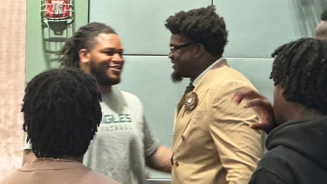 Jalen Carter (left) was on hand to hear Jordan Davis (right) talk to reporters about his contract extension that made the Eagles DT the highest-paid nose tackle in the NFL.