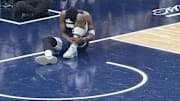 Minnesota Timberwolves guard Anthony Edwards grabs at his ankle during the second quarter of Game 2 of a Western Conference semifinal series against the Golden State Warriors on Thursday, May 8, 2025, at Target Center in Minneapolis. 